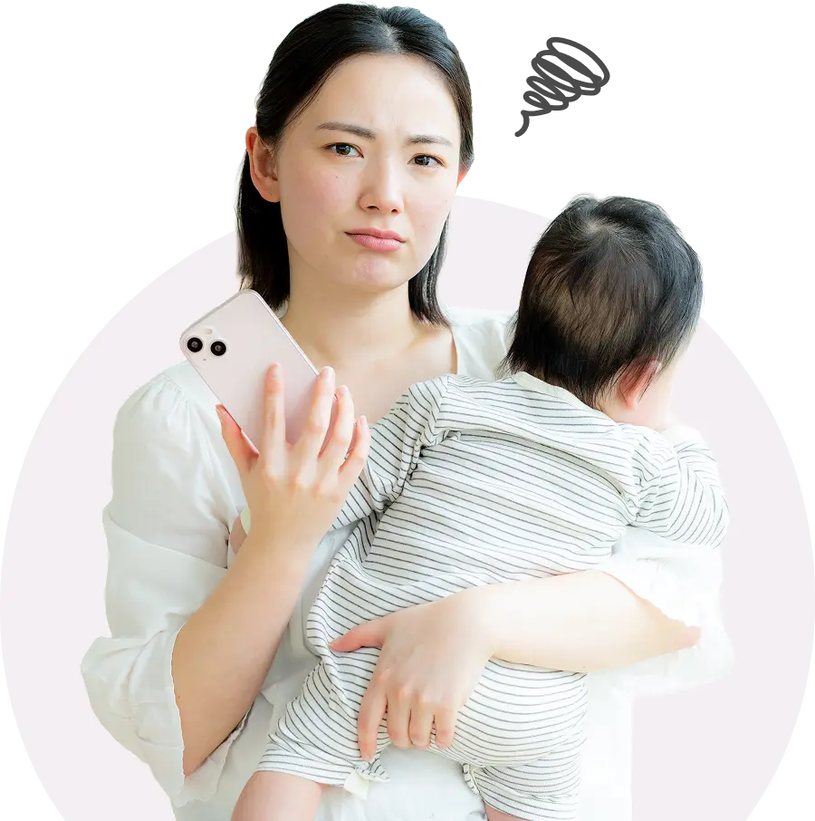 悩んでいる母親の写真