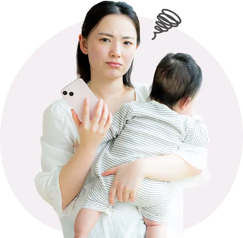 悩んでいる母親の写真